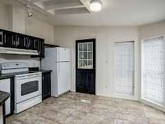 Kitchen View with exterior door Kitchen View with exterior door