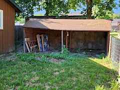 Covered storage shed