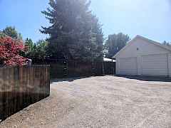 Detached garage w/oversized parking area